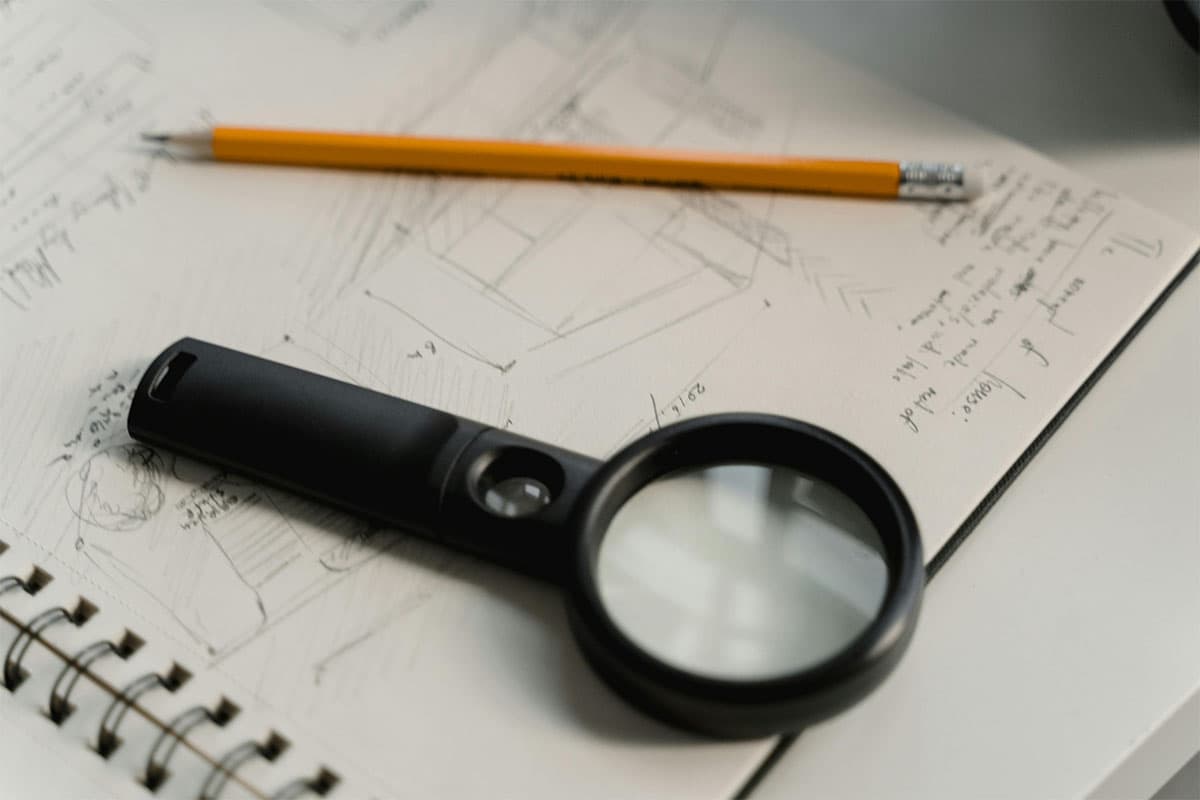 Snagging inspection notes and pencil on a property drawing